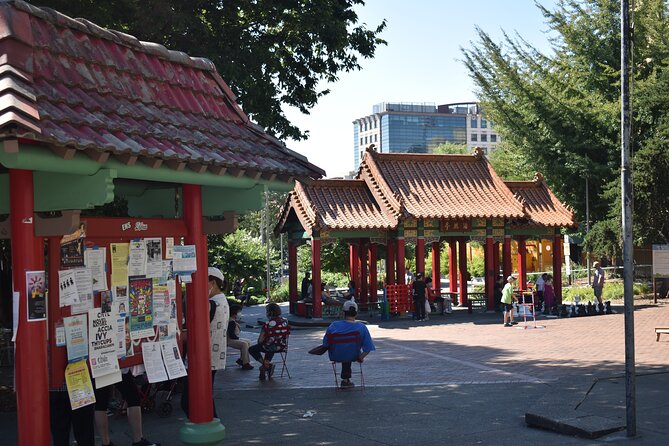 Eat Around the World Seattle Food Tour - Entering the Chinatown International District With a Food Map