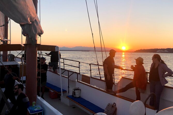 Evening Colors Sunset Sail Tour in Seattle - Helping hoist the sails, then sailing with the engine off