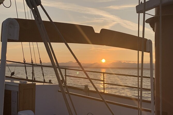 Evening Colors Sunset Sail Tour in Seattle - Beverages, possible cannon salute, and the sunset atmosphere