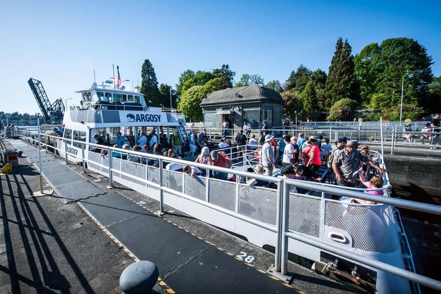 Seattle: Locks Cruise with Local Guide - Seattle landmarks from sea level: Space Needle, waterfront piers, and more