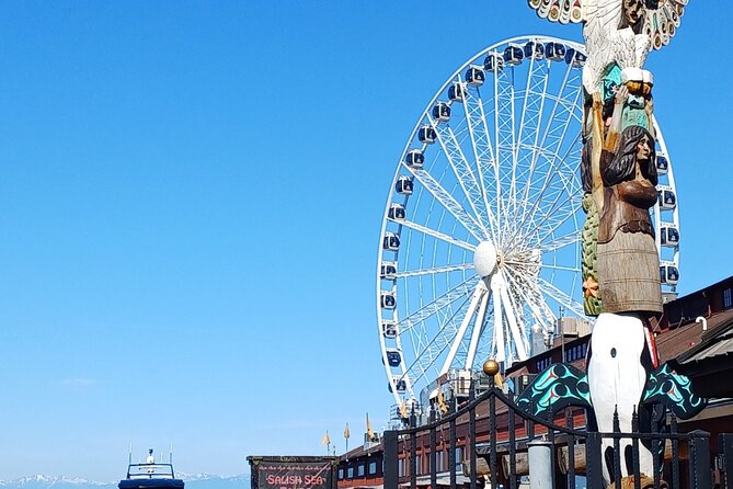 Seattle Waterfront Electric Scooter Tour with Great Wheel - Miner’s Landing Pier 57, Great Wheel, and the start-of-tour energy