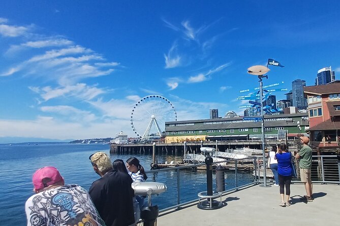 Seattle Waterfront Electric Scooter Tour with Great Wheel - Edgewater Hotel and Pier 70, where Seattle gets funny and specific