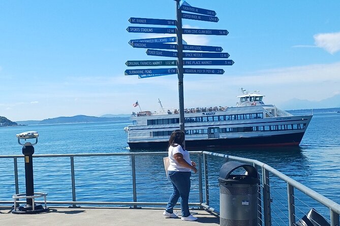 Seattle Waterfront Electric Scooter Tour with Great Wheel - Pier 91 cruise-terminal energy and the 1909 cast-iron pergola photo moment